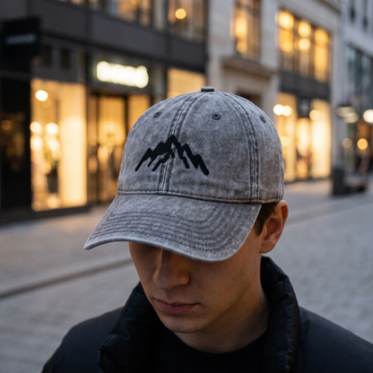 Vintage Embroidered Mountain Cap worn on a city street at dusk